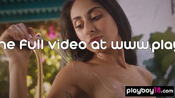 Skinny brunette beauty stripping and showing her exotic pussy