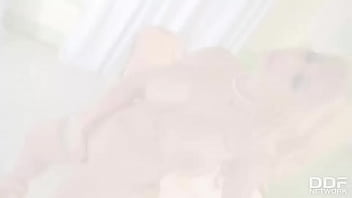 Busty babe's boredom a glass dildo ride at home