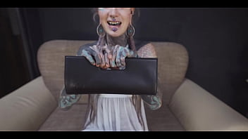 Tattoo slut sinks a thick metal toy deep into her hole