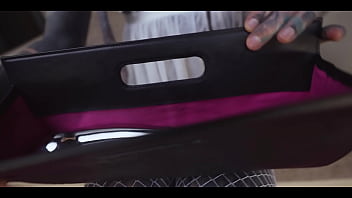 Tattoo slut sinks a thick metal toy deep into her hole