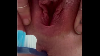 Shoving a toothbrush up her butt Shoving a toothbrush up her butt