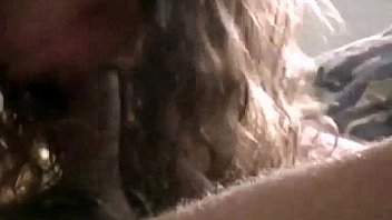 Couple exchanging oral camera