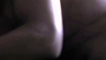 Couple exchanging oral camera