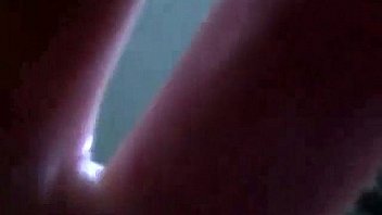 Couple exchanging oral camera