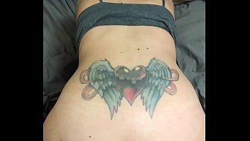 Tattooed brunette fucks