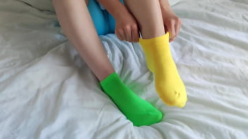 Her Brightly Colored Mismatched Socks Are Perfect For A Sensual Sockjob thumbnail