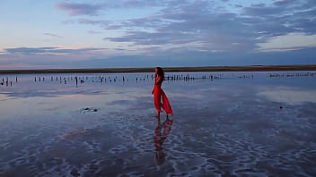 Pink sunset and mature woman Pink sunset and mature woman