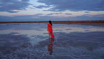 Pink sunset and mature woman Pink sunset and mature woman