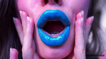 Wet red sticky lipgloss kiss