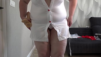Curvy nurse tries on new medical uniform and big dildo unpacking a gift milf with big ass and big tits pawg