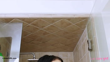 Striking brunette beauty enjoys a sensual bath