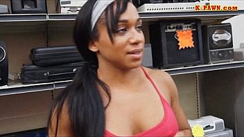Muscular chick poses on camera and fucked in the pawnshop
