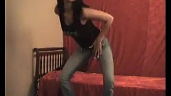 Cute slut strips and masturbates