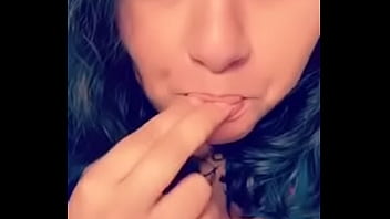 Licking fingers and rubbing tits for me
