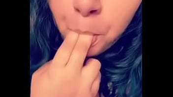 Licking fingers and rubbing tits for me