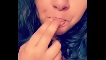 Licking fingers and rubbing tits for me