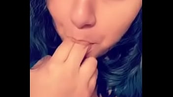 Licking fingers and rubbing tits for me