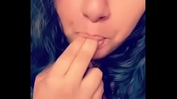 Licking fingers and rubbing tits for me