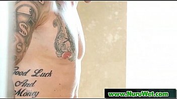 Japanese babe gives a full service nuru massage 21