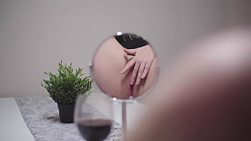 Masturbating in front of mirror