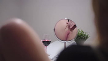 Masturbating in front of mirror