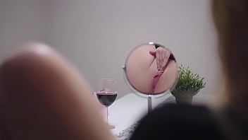 Masturbating in front of mirror