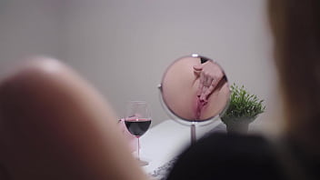 Masturbating in front of mirror