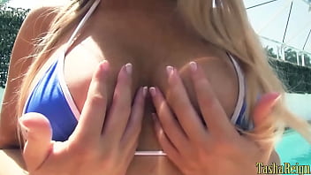 Tanned blonde tasha reign lounges & pleasures herself by the pool
