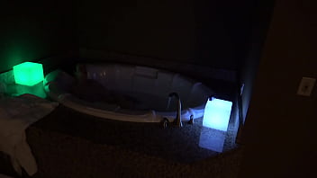 Bbw pleases herself in a big jacuzzi at night