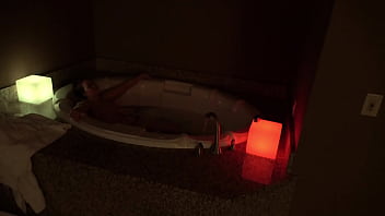 Bbw pleases herself in a big jacuzzi at night