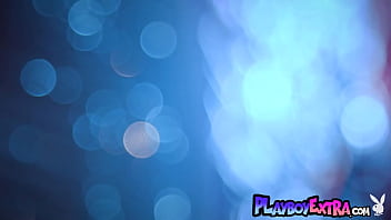 Busty naked blonde beauty spreading her long legs outdoor