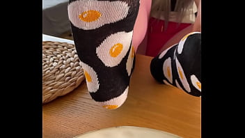 My so delicious nylon soles next to your plate with fried eggs