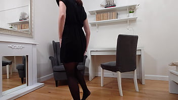 Evelyn in a tshirt and black pantyhose modeling and teasing