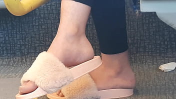 Shoeplay of stupid hot brunette with gorgeous feet wearing slides on train