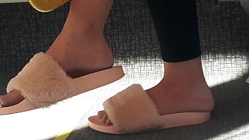 Shoeplay of stupid hot brunette with gorgeous feet wearing slides on train
