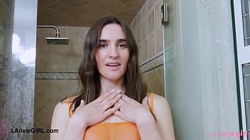 Fresh faced brunette enjoys a sensual bath