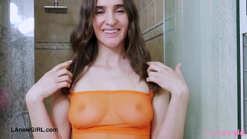 Fresh faced brunette enjoys a sensual bath