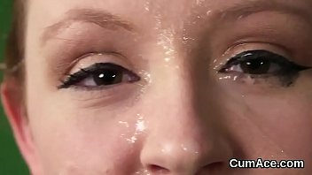 Nasty looker gets cumshot on her face eating all the cream