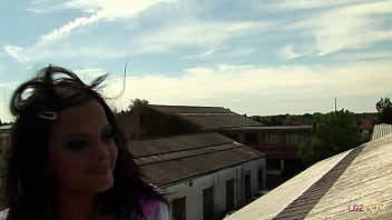 A pretty brunette lesbian is pleased by her girlfriend with a nice large dildo