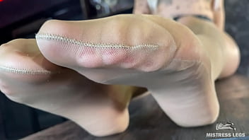 Rubbing my nylon feet against each other right above your face Rubbing my nylon feet against each other right above your face