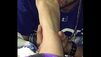 Licking her feet before bed