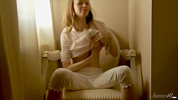 Sexy young blonde paula z has some finger action over her chair