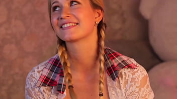 Pretty woman chooses a dildo for her pussy