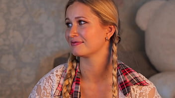 Pretty woman chooses a dildo for her pussy