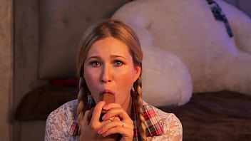 Pretty woman chooses a dildo for her pussy