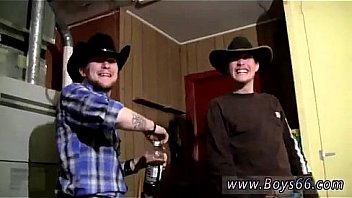 Male Models Cowboys Ty & Lee Pissing Up The Garage thumbnail