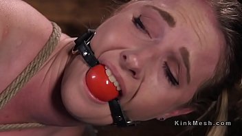 Brunette slave flogged in several hogties