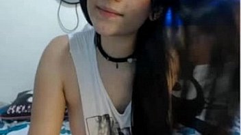 Cute brunette teen fingering pussy on cam