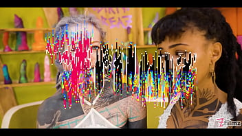 Tattooed lesbian strap on fuck squirting and piss play