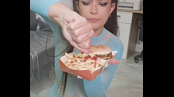 Playing with junk food between my mouth and my hair